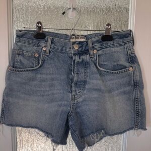 Free People denim distressed high rise shorts. Size 27.